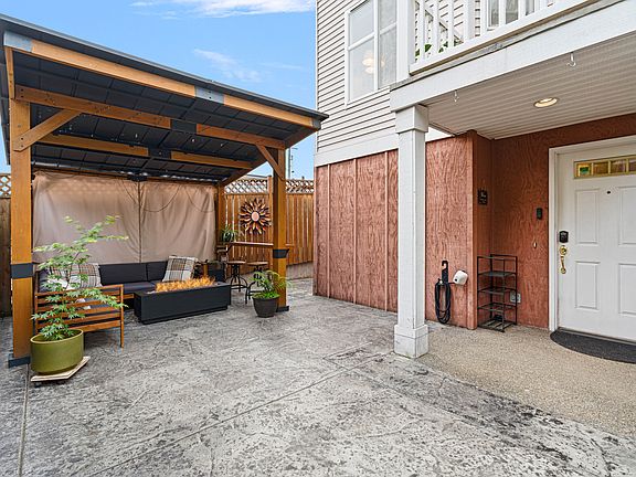 Private backyard oasis_ideal for weekend barbecues or a quiet morning coffee.