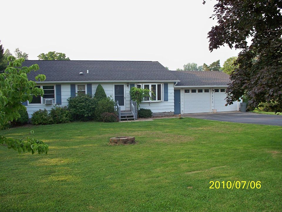 Front of Home and 2 car attached garage