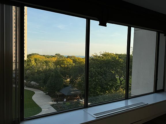 Living room view including lake
