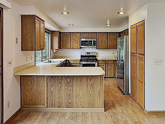 Kitchen with stainless steel appliances