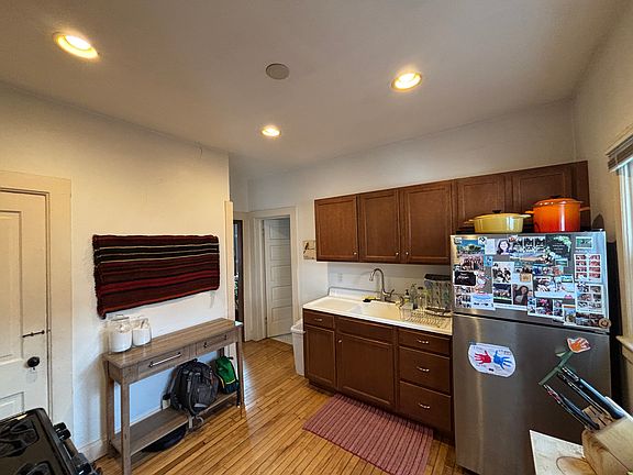 Kitchen facing doorway to dining room