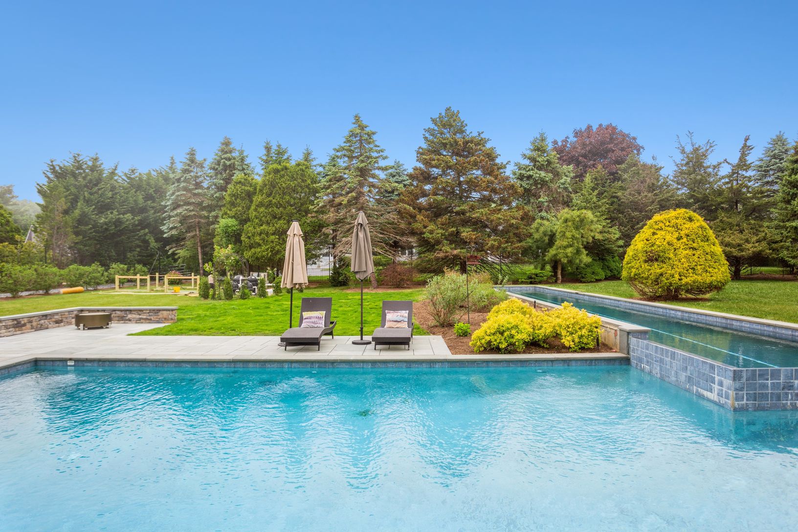 Two beautiful heated  pools, one for laps, the other 20x40
