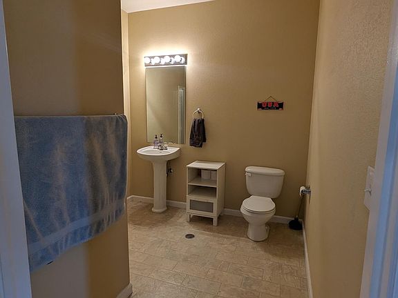 first floor full bathroom (shower behind the towel rack)