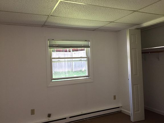 Other side of the bedroom with window and spacious closet
