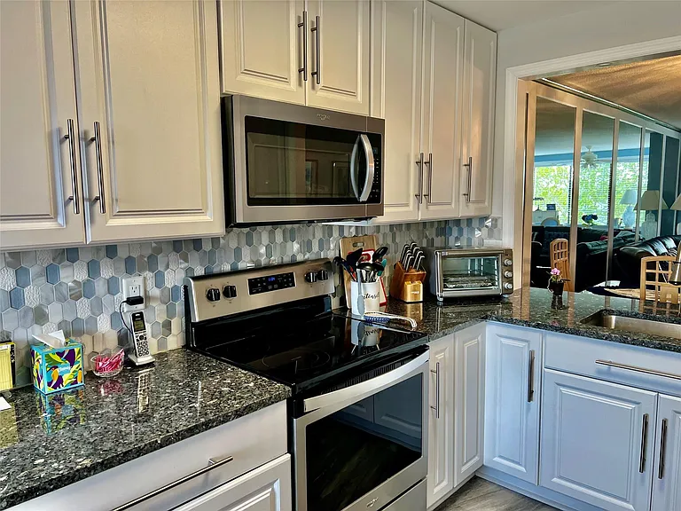 9787 N Belfort Cir #307 — Photo 4