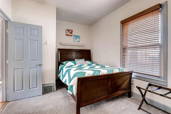 Restful and beautiful main floor bedroom with queen bed