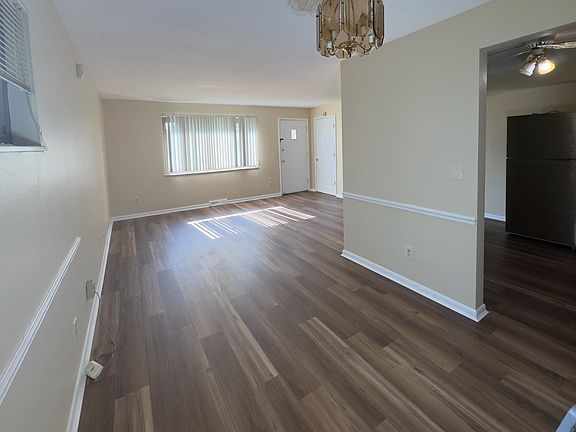 Open living /dining combo with new flooring