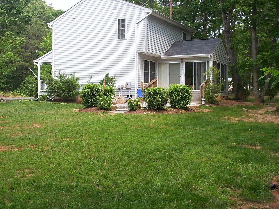 View of the home from the shed in the yard.
