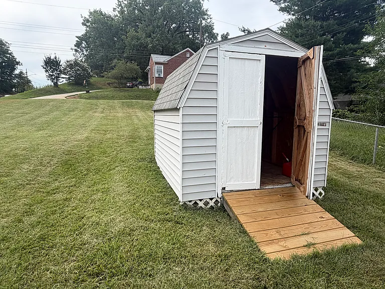 Shed for mower, bikes, recreation equipment storage, etc.