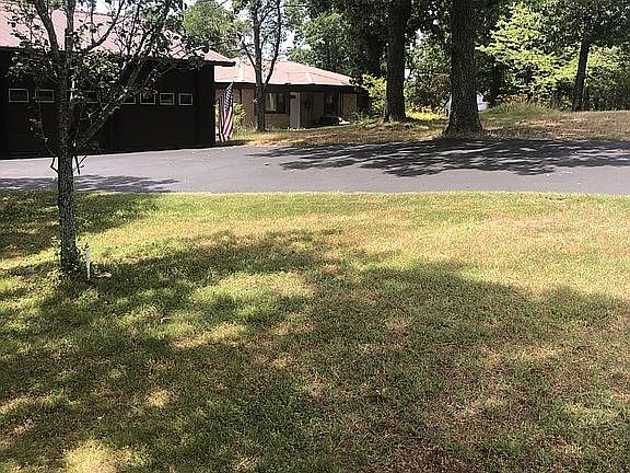 Huge detached 3 car garage.