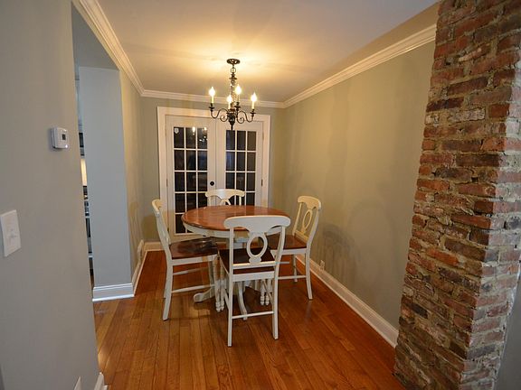 Dining room with exposed brick 