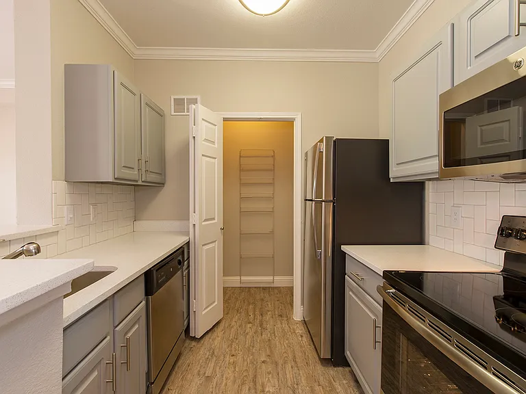 Kitchen with granite-style countertops and upgraded cabinetry