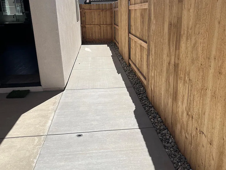 No maintenance side yard with french door to living room. Perfect place to add a doggy gate for your pet!