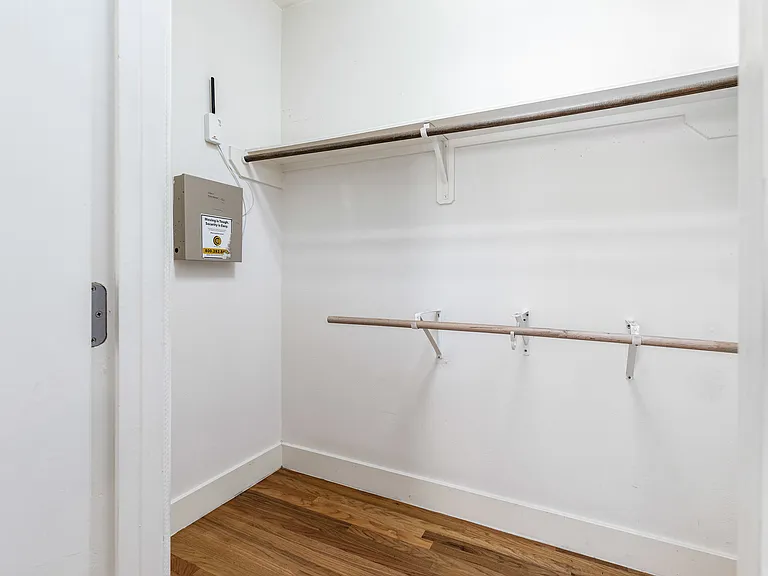 Spacious walk-in closet for primary bedroom