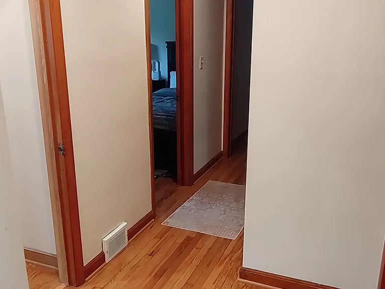 First floor hallway to bedrooms.