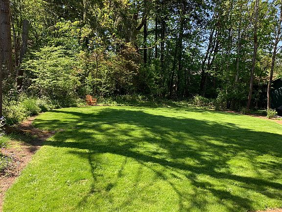 Beautiful 1/2 acre lot & you do not have to mow it. Landscape maintenance included
