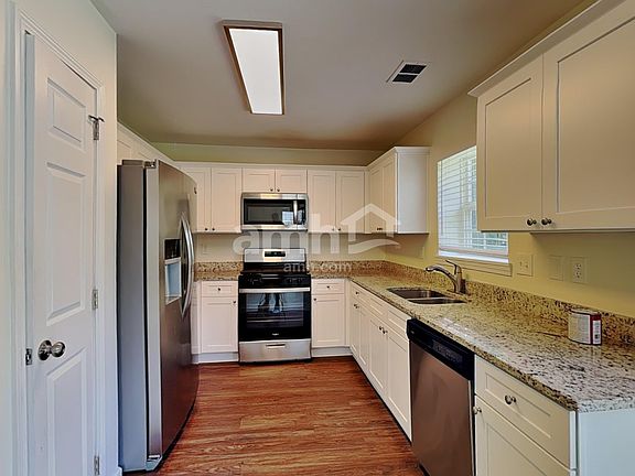 3rd image of 7628 Nicolette Ct