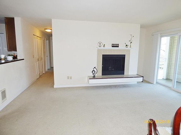 Bright living space with wood fire