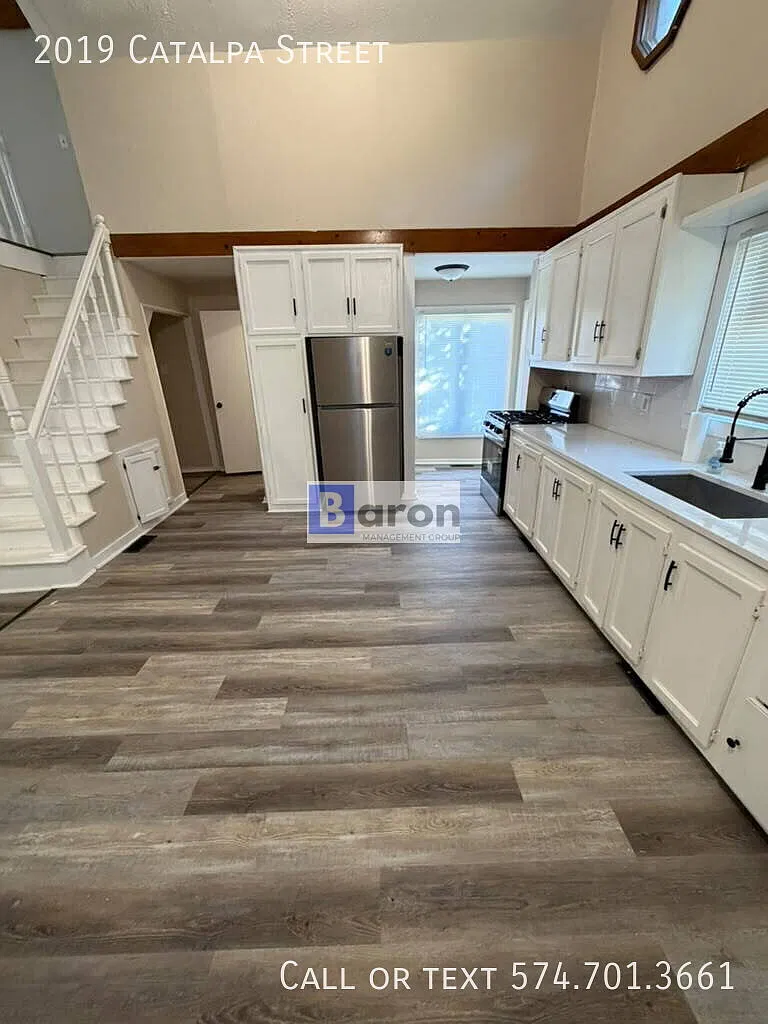 "Charming 4-Bed Home with Gleaming Hardwood Floors at 2019 Catalpa St, South Bend!" — Photo 1