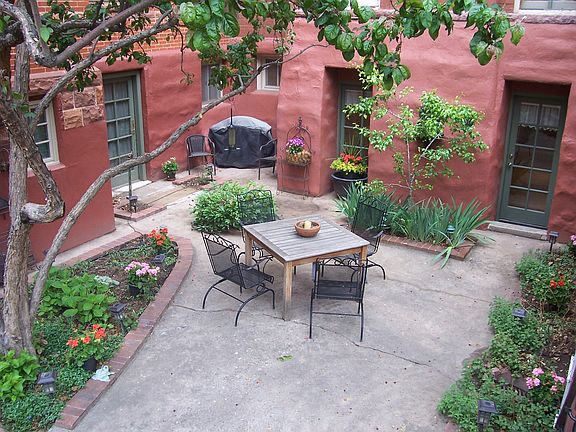 view of patio & gardens