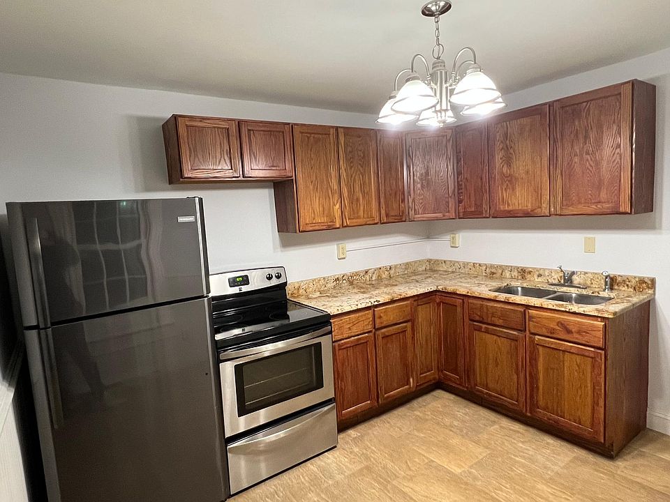Kitchen with stainless steel appliance