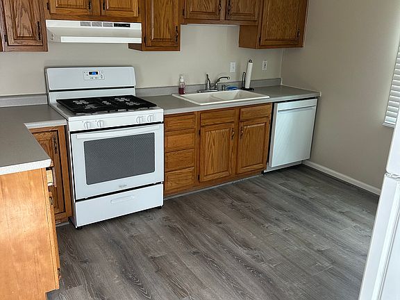 Kitchen featuring all appliances including a dishwasher.