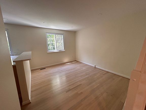 Dining room backs to tranquility of trees.