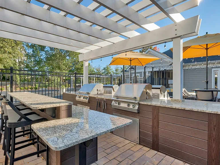 Enjoy our poolside grilling stations and dining area