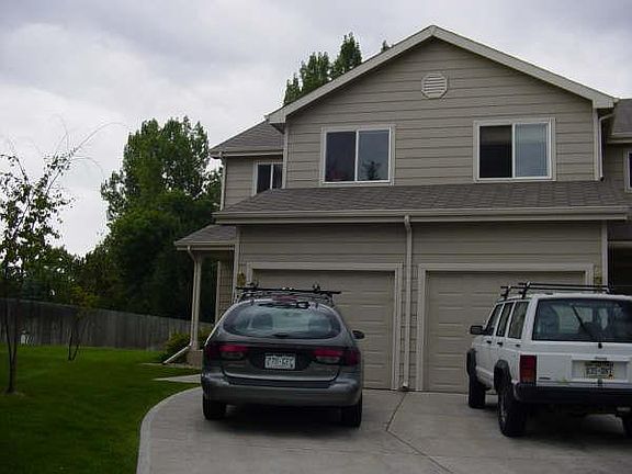 Parking for 3 cars on driveway and 1 in garage with opener