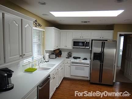 Upgraded floors and appliances!! A lot of natural sun light!!