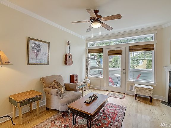 Living room with access to east-facing deck. Light and bright!