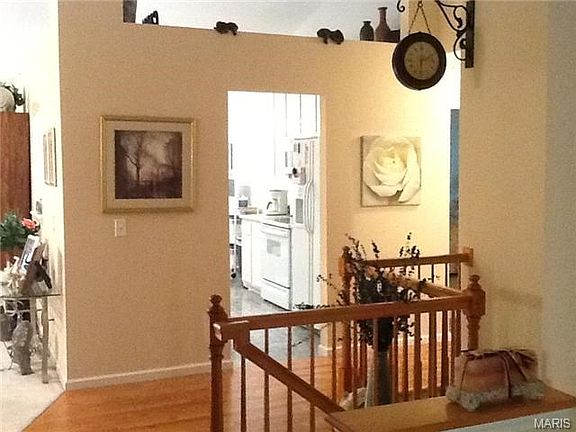 Inside the front door is a spacious foyer with easy access to an
