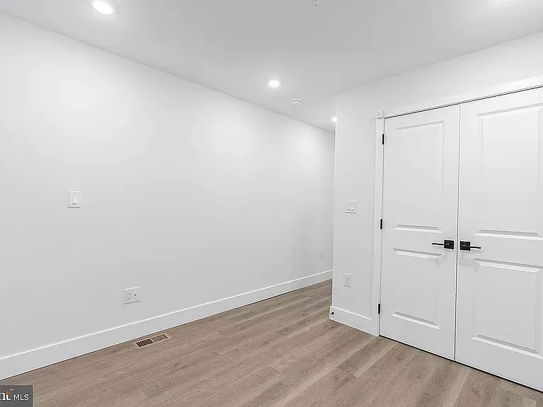First floor bedroom. Has access to outdoor living space.