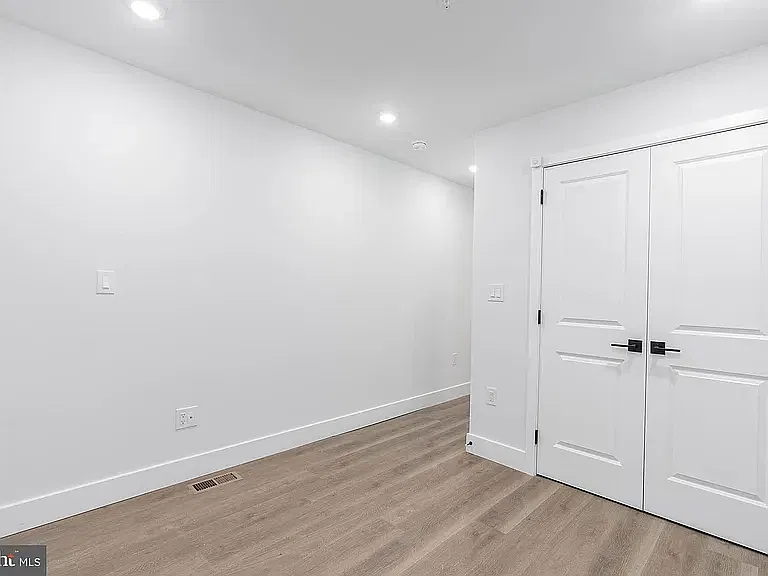 First floor bedroom. Has access to outdoor living space.