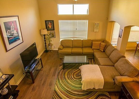 View of living room from stairs