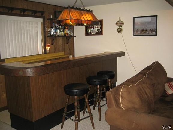 Spacious Lower Level Family Room with bar