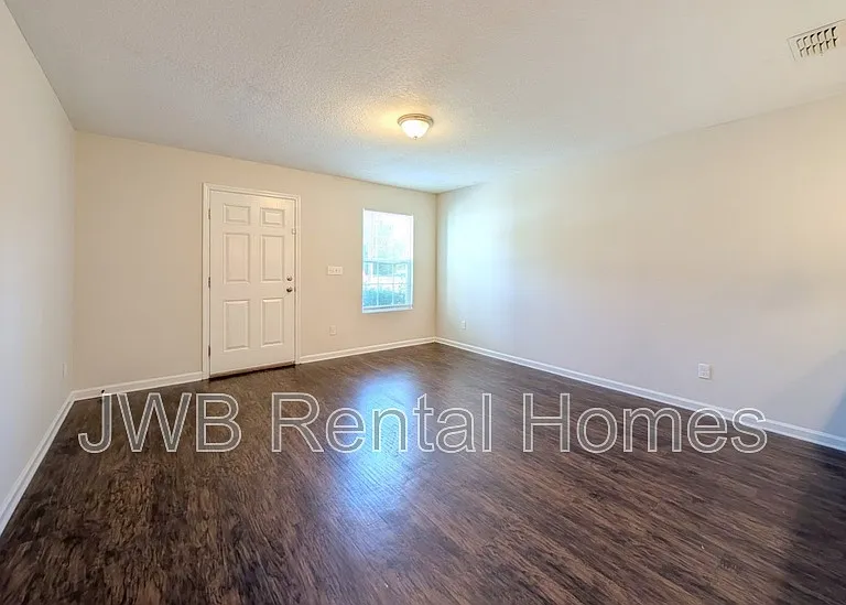 8401 McGirts Village Ln — Photo 5