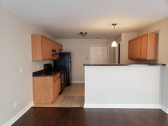 Electric cooking in Kitchen with garage entrance