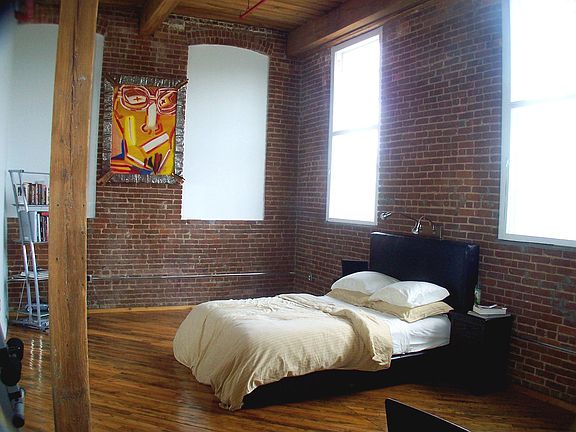 Private Master Suite with sit/work area. 15' ceilings to appreciate the ample 