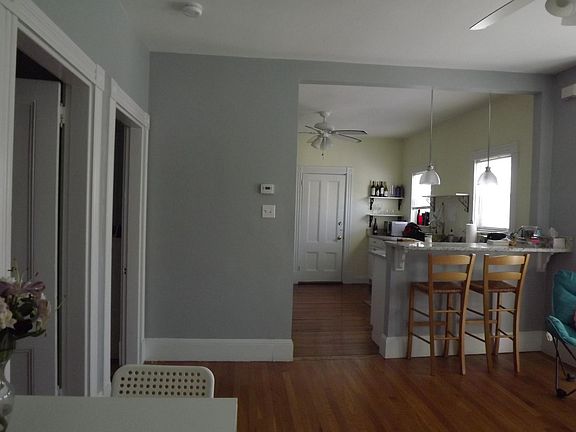 View into sunny, large kitchen