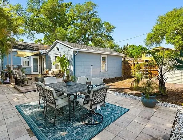 Backyard patio with furniture (archival photo)