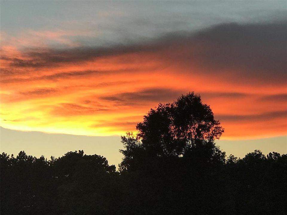 Build your dream home on this 10.94 Acres and watch sunsets like this!