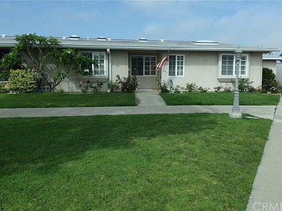 Front View of unit faces large greenbelt.