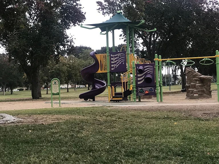 One of 2 playgrounds at city park one block away