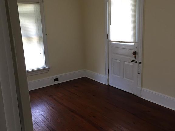 3rd bedroom with entrance to balcony deck