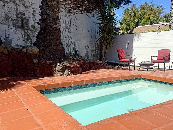 Heated in-ground pool/spa.