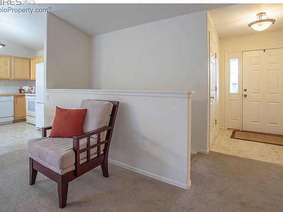 Front door & stairs to full basement