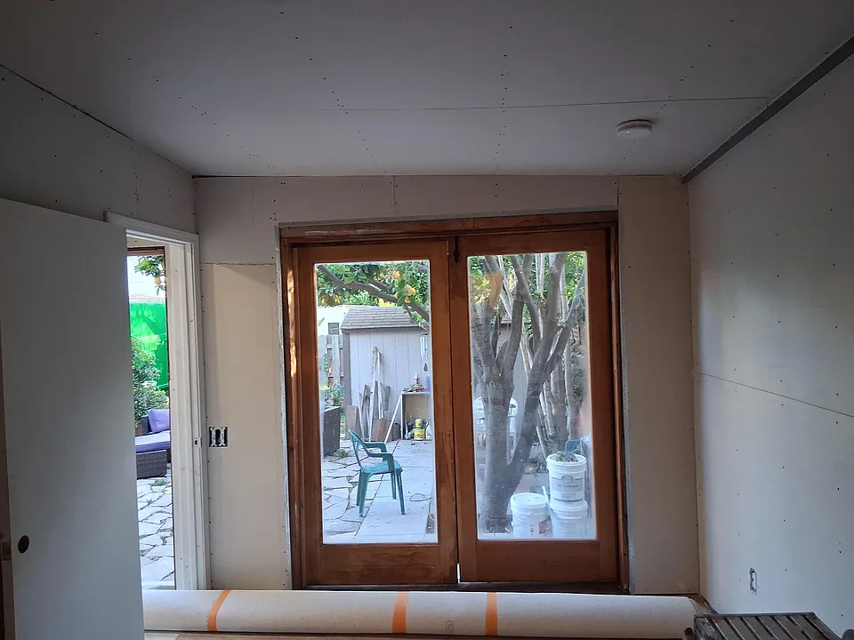 Master bedroom door looking into private yard