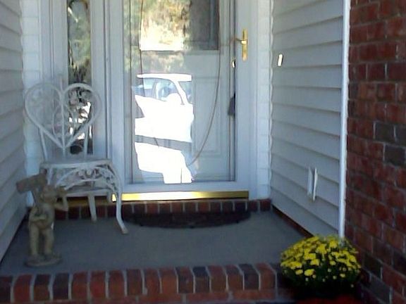 Attractive covered porch entry