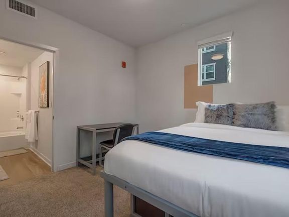 Catch some 'zzz's in this comfy room! This room is equipped with a full size bed.
